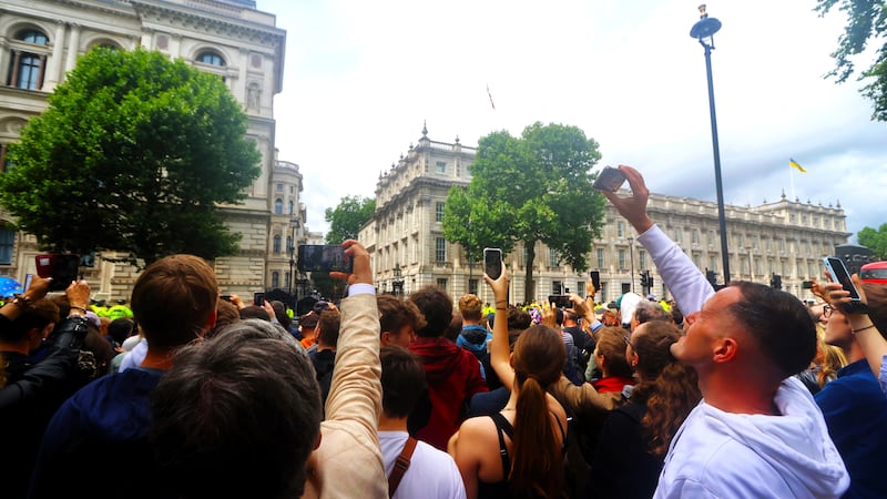 Crowds gather for a glimpse of Keir Starmer outside Downing Street in London on Friday.