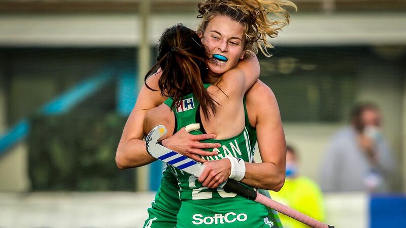 Ireland’s Anna O’Flanagan celebrates scoring her second goal with team-mate Zara Malseed during the FIH 2022 Women’s Hockey World Cup Qualifer Final against Wales in Pisa. Photograph: Giuseppe Fama/Inpho